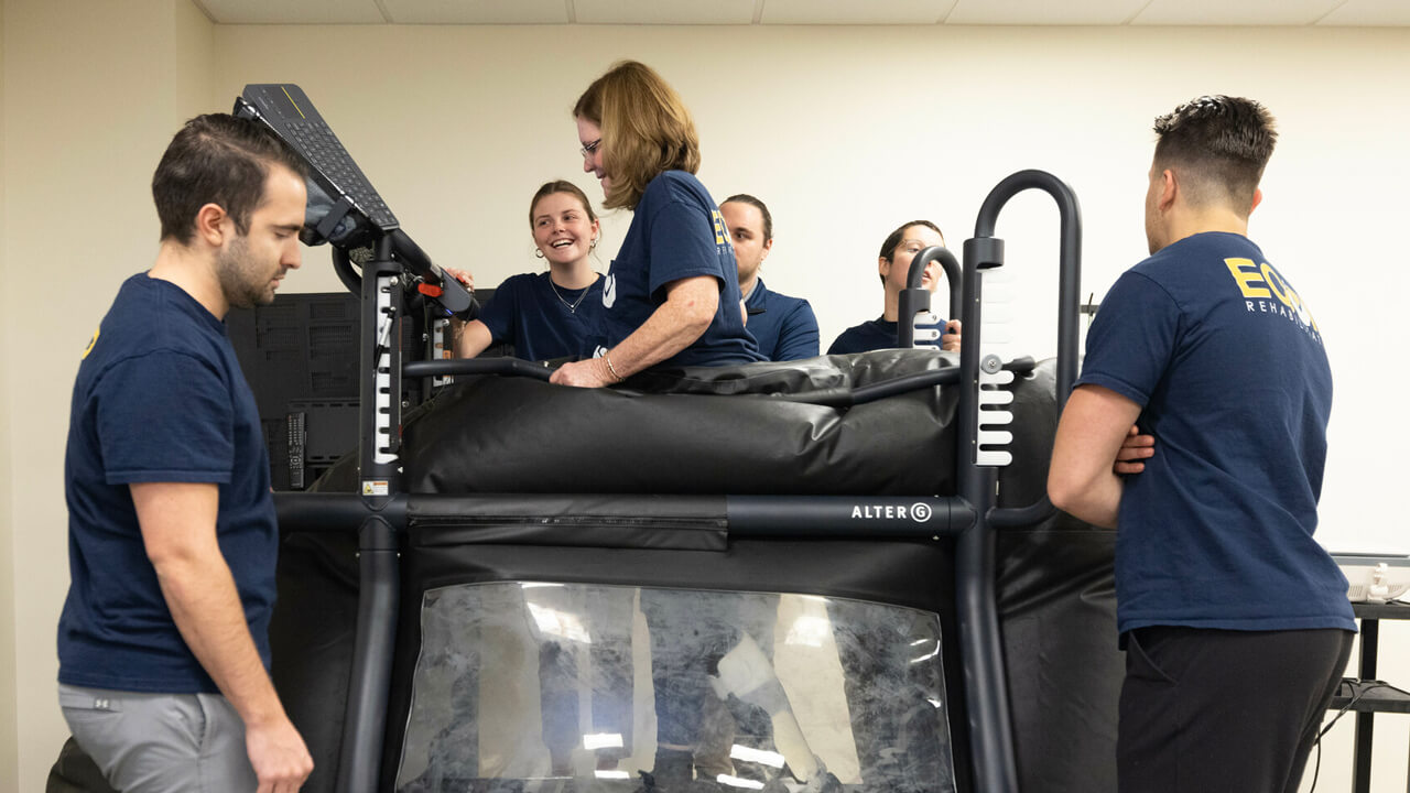 Students performing an experiment with analytical exercise equipment